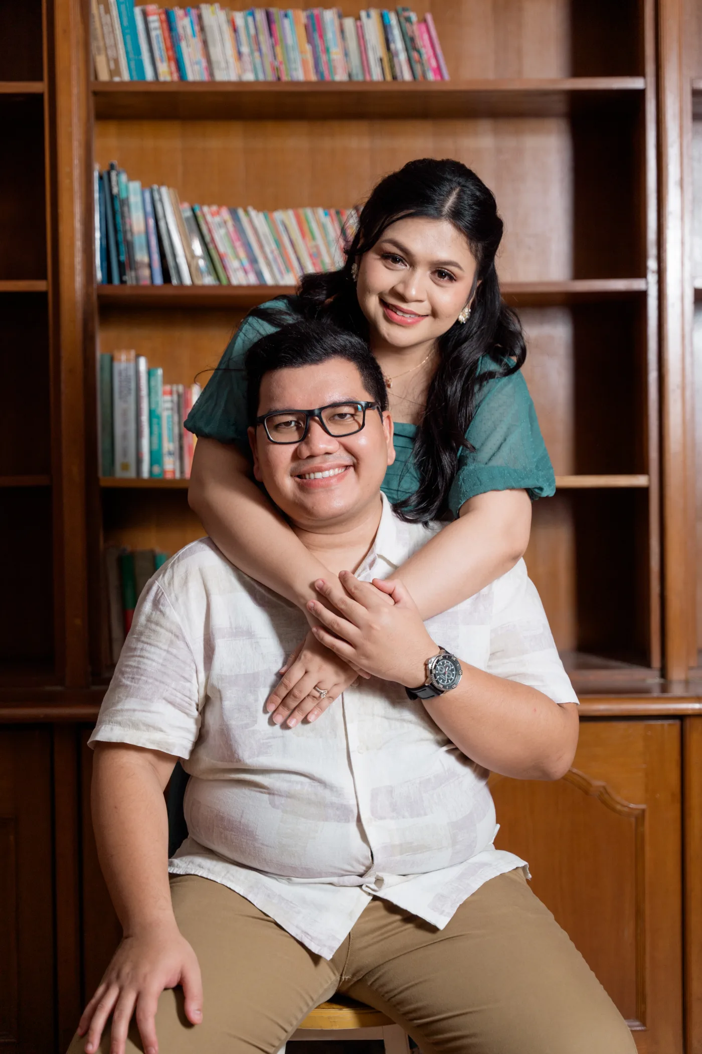 Held close — Reynaldo dan Herlina